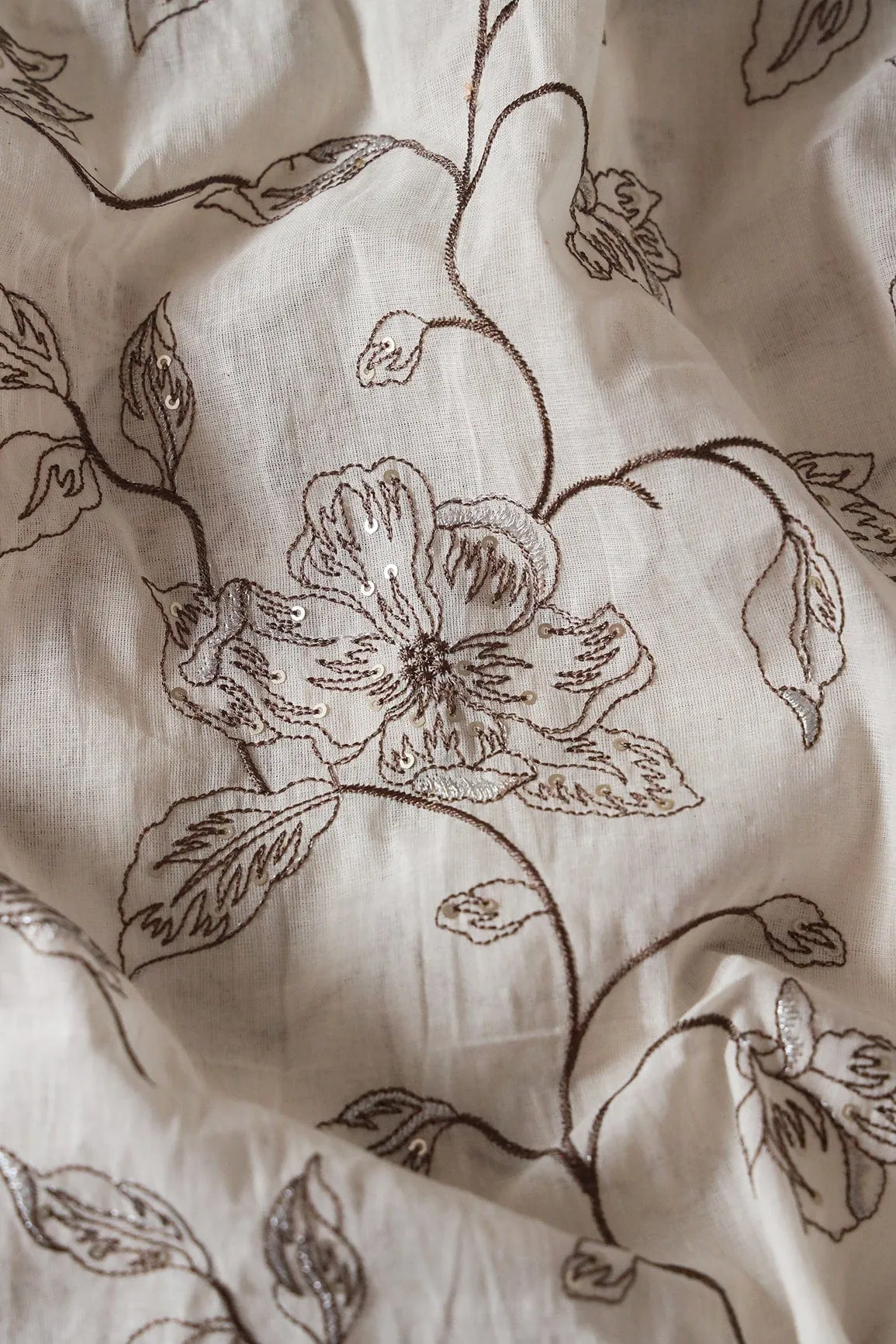 Brown Thread With Silver Sequins Floral Embroidery Work On Off White Organic Cotton Fabric